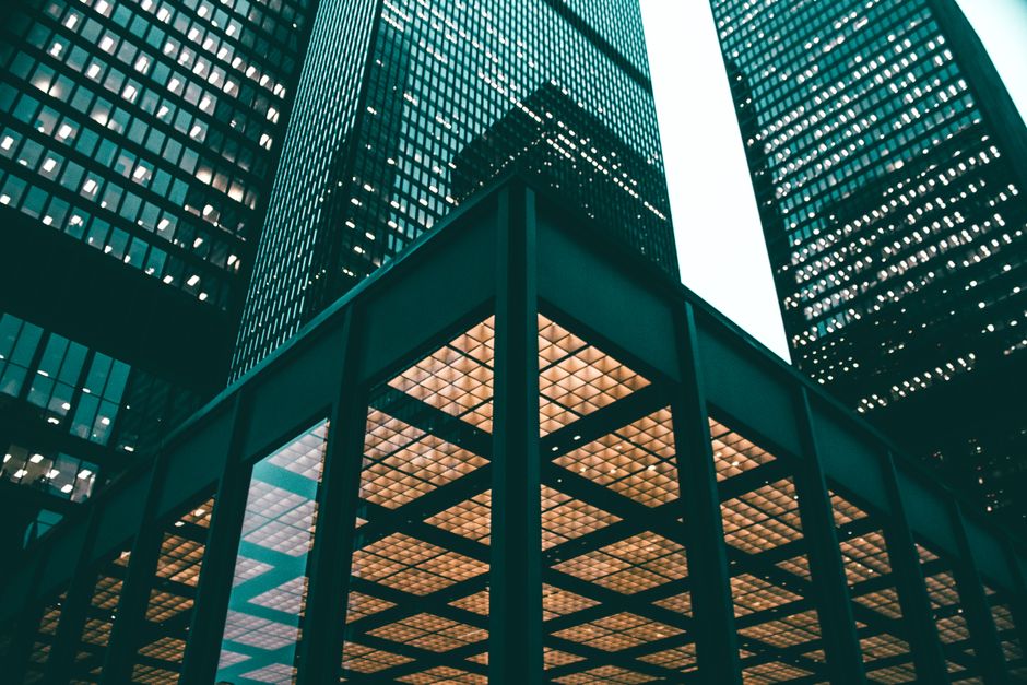 Low angle view of Toronto high-rises showcasing modern architectural design during daytime.